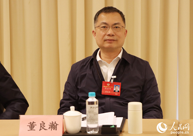 福建省政協(xié)常委、福建省紅十字會分管日常工作的副會長、民革福建省委會副主委董良瀚。人民網(wǎng)記者 林盈攝